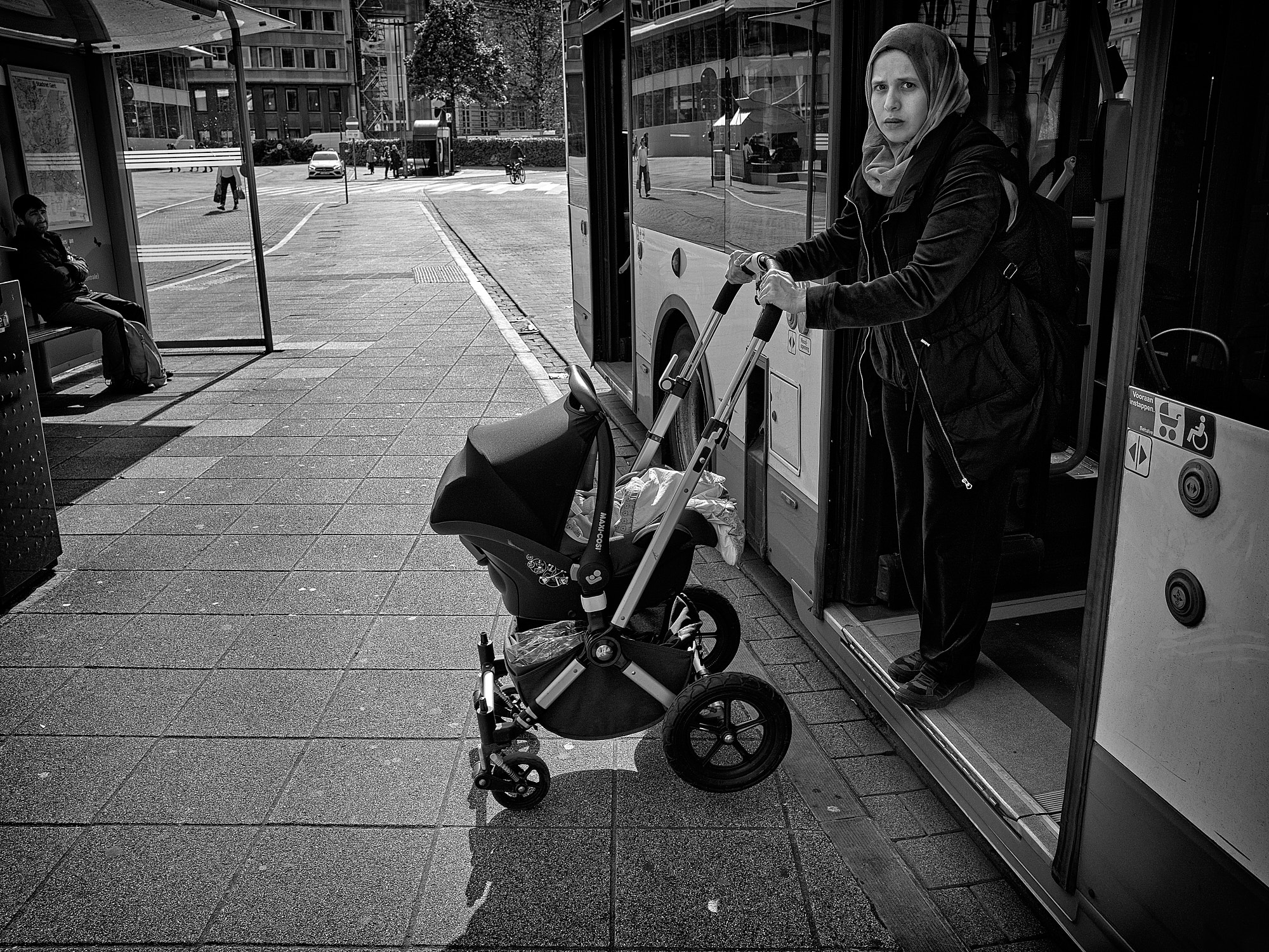 65 Young mother wearing a hijab
